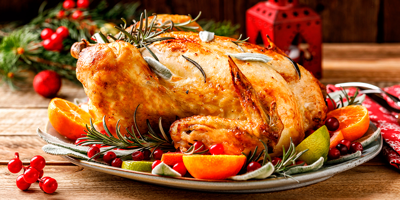 Курица запеченная с апельсинами и клюквой